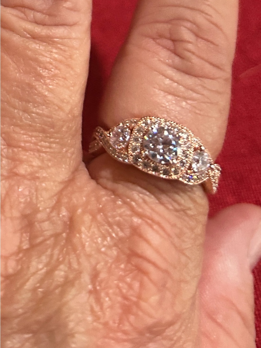 Source Unknown Rose Gold Three-Stone Twisted Halo Ring